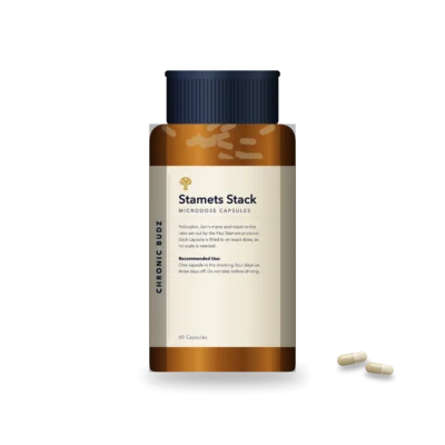 Stamets stack microdose capsules in an amber bottle